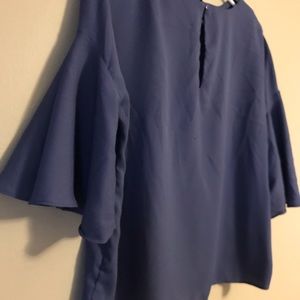 Flows lavender blouse bell sleeves